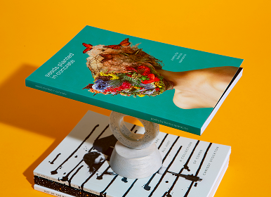A teal magazine cover design mockup, photography
